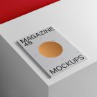A4 magazine mockup with hot stamping design on white cube form studio magazine mockup.