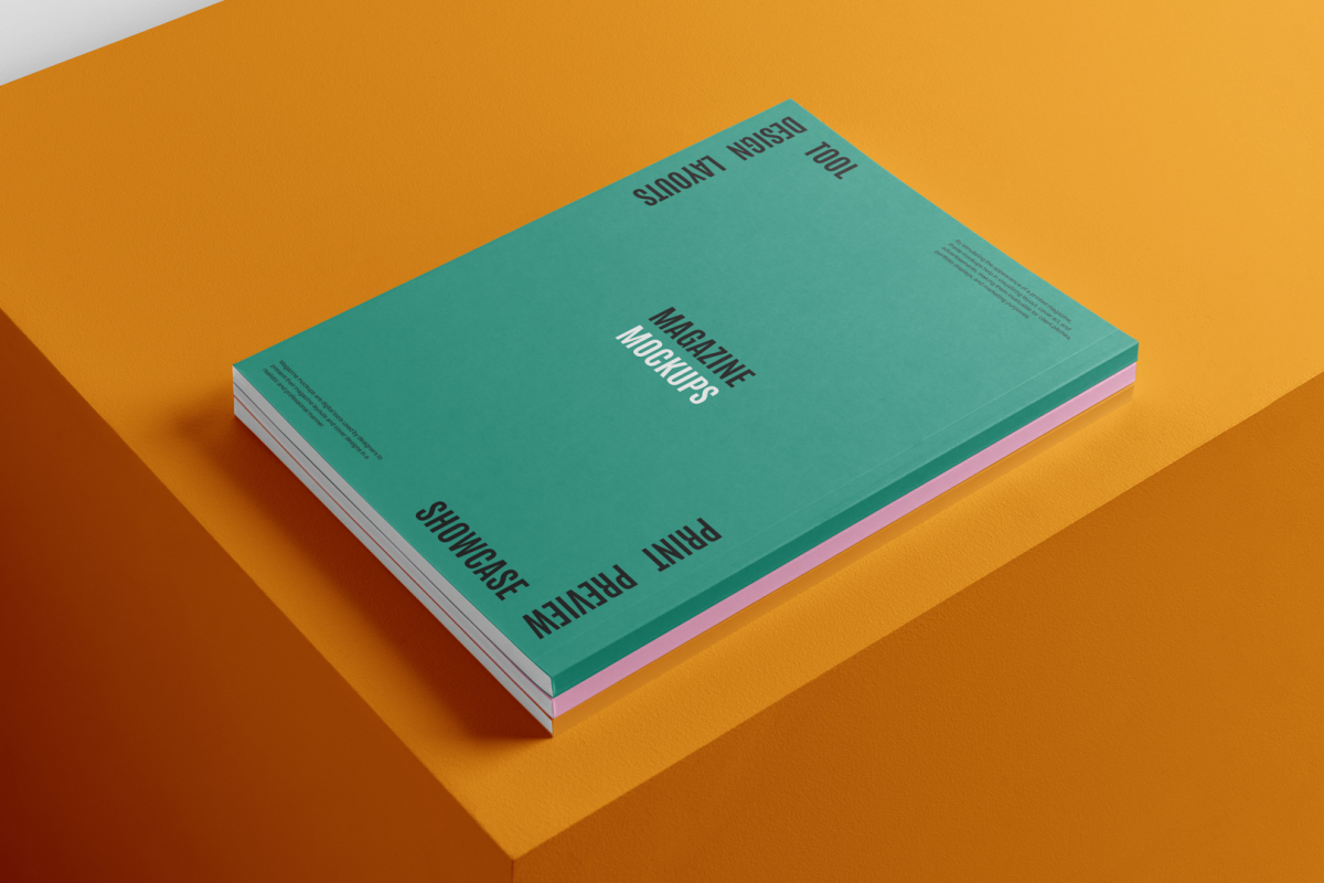 Three a4 magazine mockup with playful design on orange cube from studio magazine mockups.