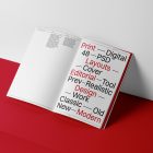 Open a4 magazine with black and red design from studio magazine mockups.