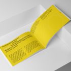 Open horizontal magazine with yellow minimal design from studio magazine mockups.