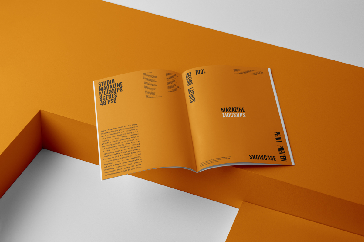 Open a4 magazine with orange playful design on orange cube from studio magazine mockups.