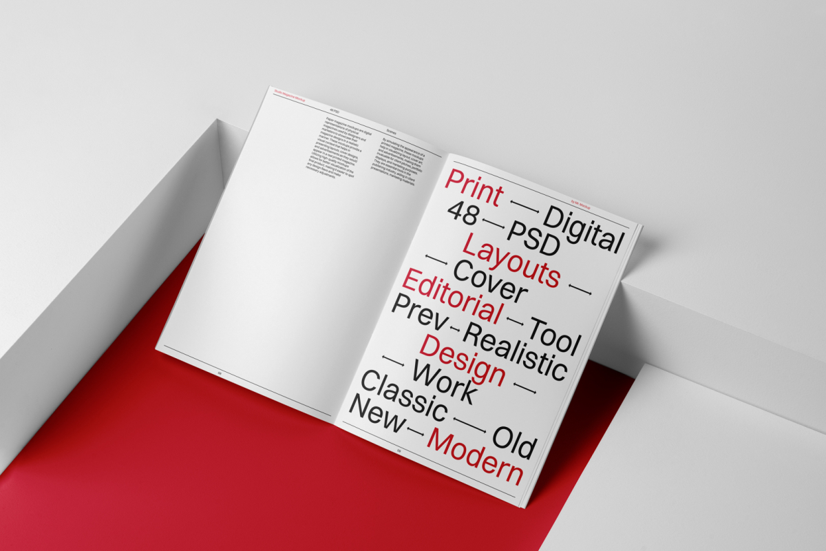 Open a4 magazine with black and red design on red cube from studio magazine mockups.