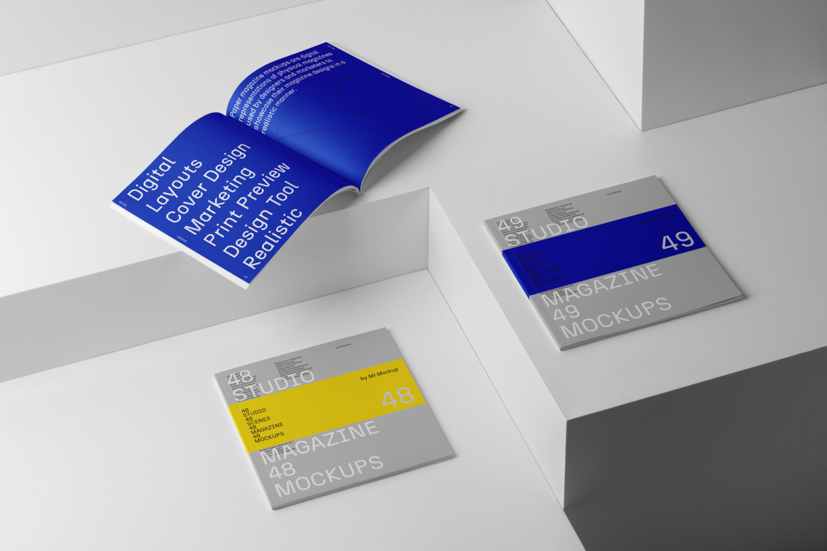 Three gray square magazines on white cubes from studio magazine mockups.