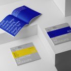 Three gray square magazines on white cubes from studio magazine mockups.
