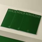 Three a4 green mgazines with elegant design on cubes from studio magazine mockups.