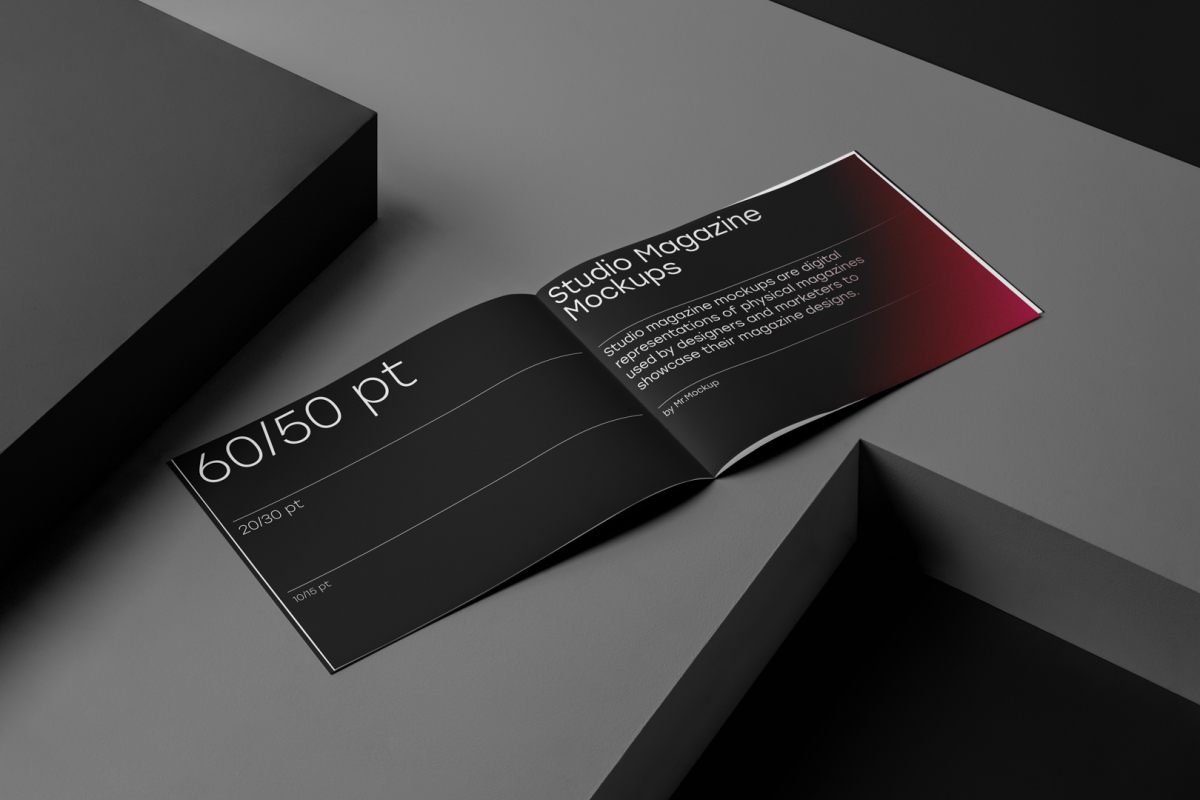 Open horizontal magazine with black modern design on dark cubes from studio magazine mockups.