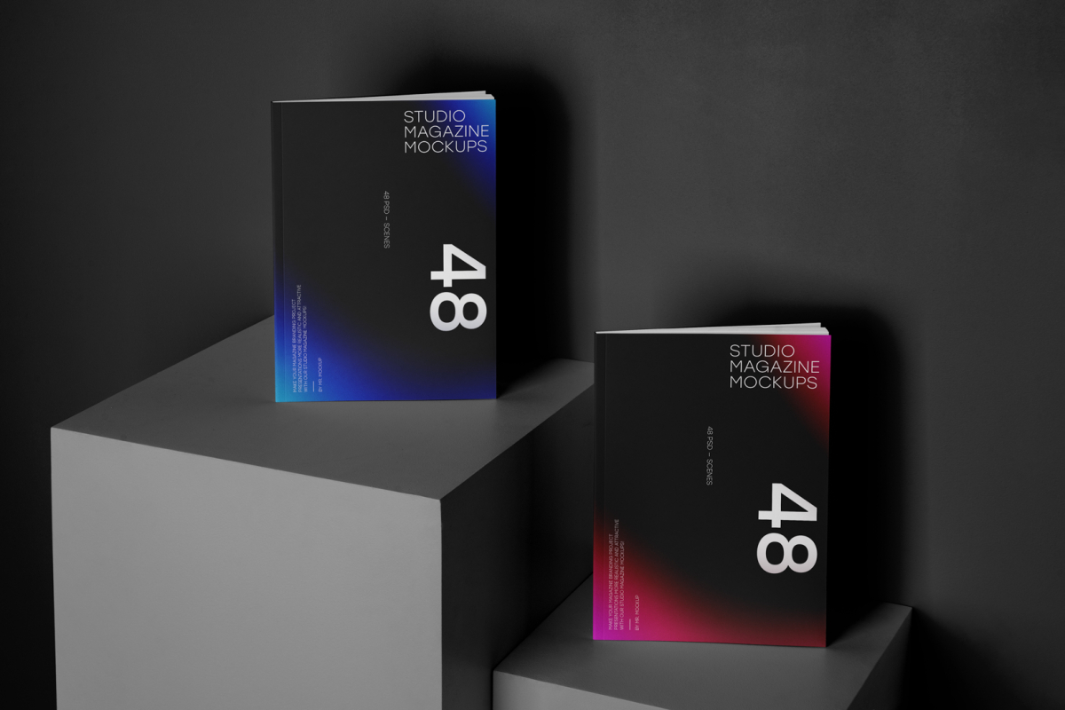 Two a4 magazine with dark modern design on black cubes from studio magazine mockups.