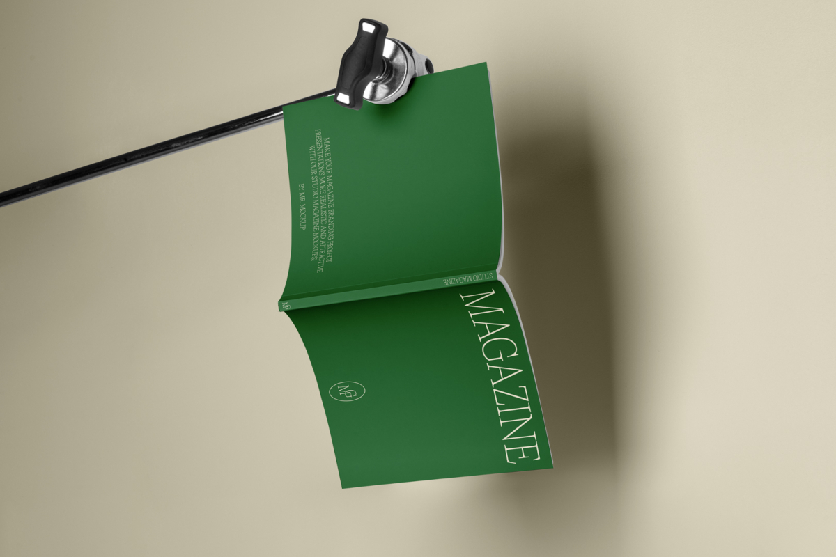Green magazine cover with elegant design on cube from studio magazine mockups.