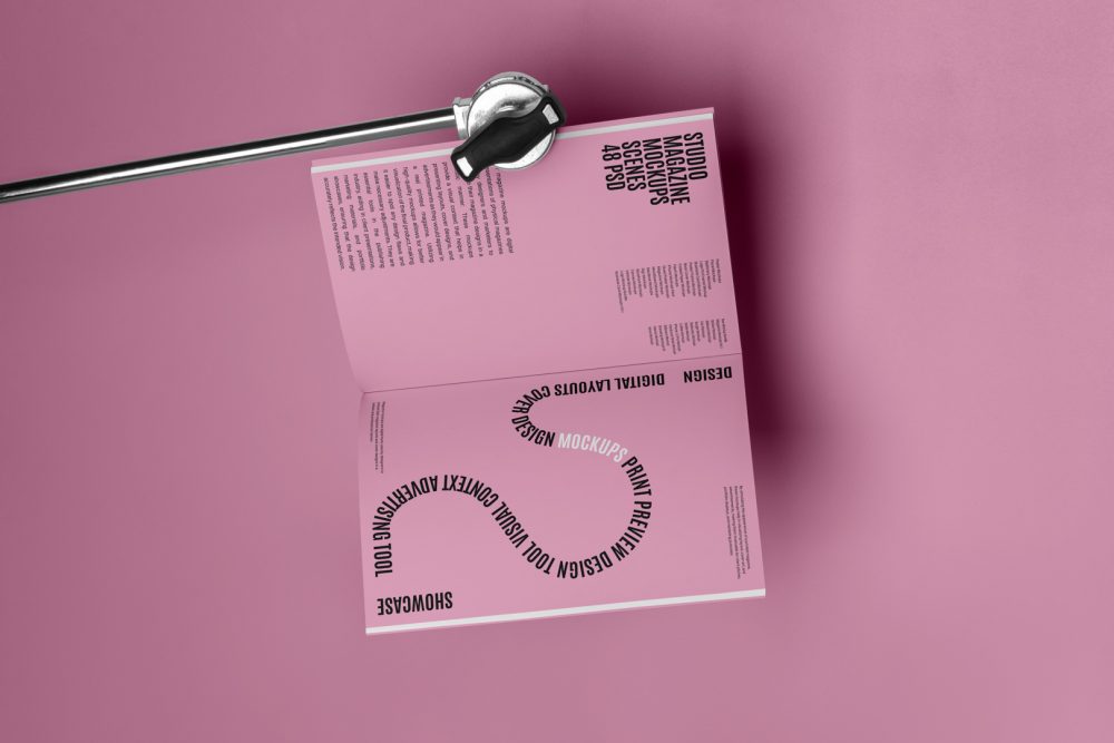 Pink a4 magazine mockup with playful design on cube from studio magazine mockups.
