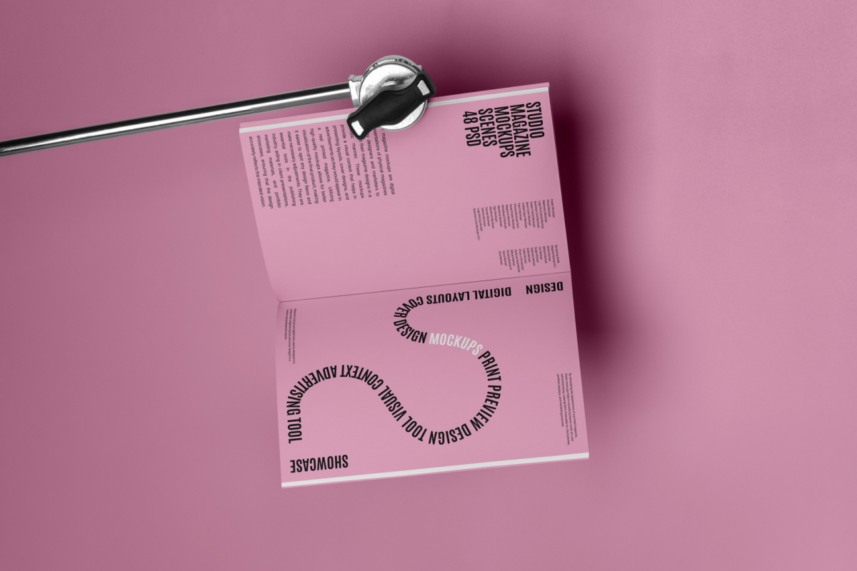 Pink a4 magazine mockup with playful design on cube from studio magazine mockups.