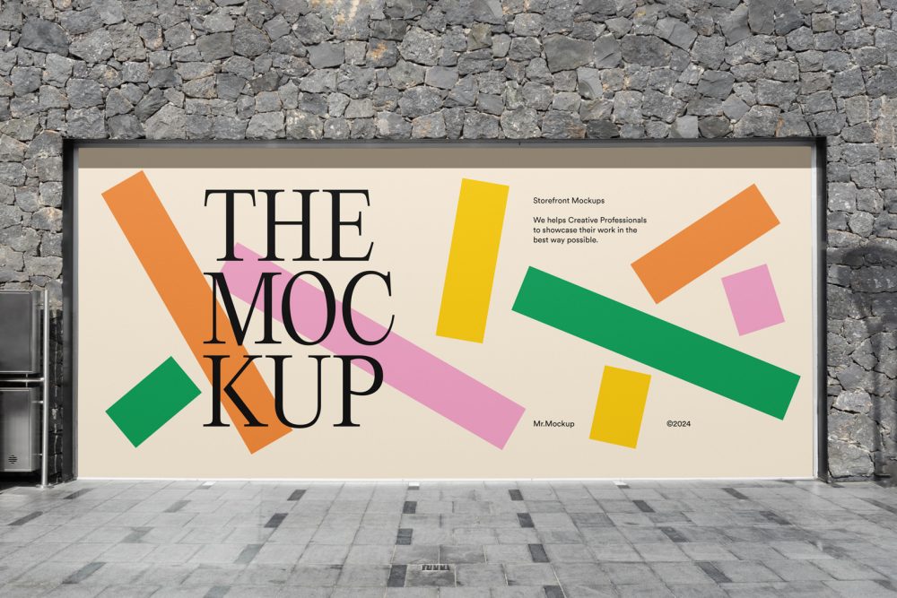 Front view, rectangle with colorful graphics and black typography space built into a stone gray wall from storefront mockups product.