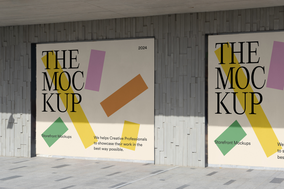 Front view, at an angle of 45 degrees, two colorful rectangle spaces with black strong typography built into a building elevation from storefront mockups product.