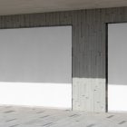 Front view, at an angle of 45 degrees, two rectangle white spaces built into a building elevation from storefront mockups product.