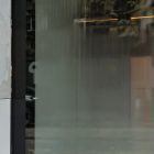 Front view, at an angle of 45 degrees, window built into building elevation from storefront mockups product.
