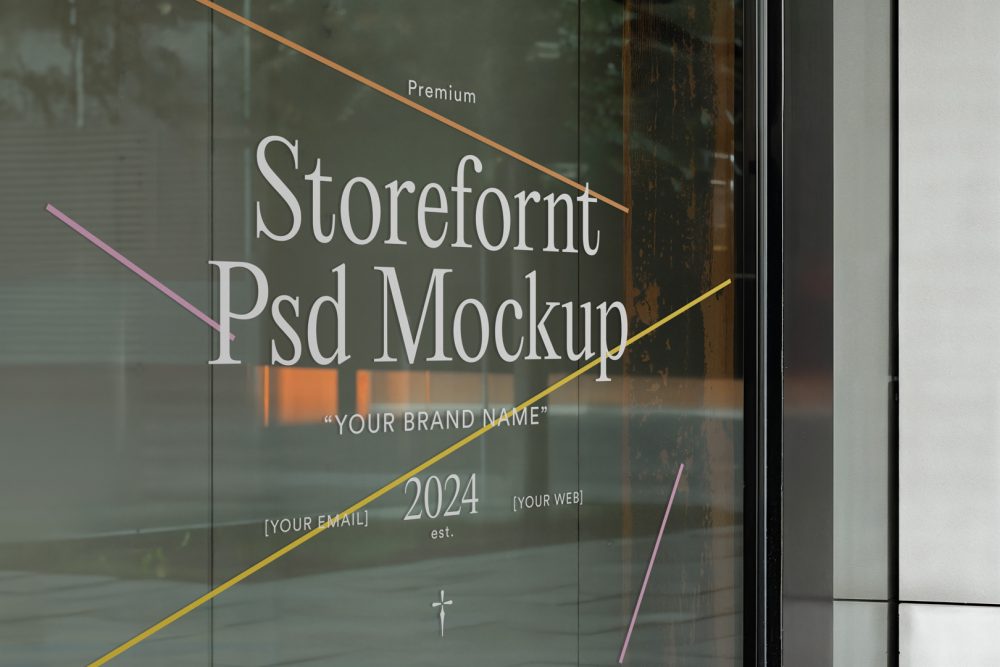 Front view, at an angle of 45 degrees, clean glass window with colorful graphics and white typography from storefront mockups product.