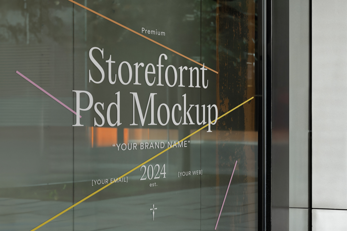 Front view, at an angle of 45 degrees, clean glass window with colorful graphics and white typography from storefront mockups product.