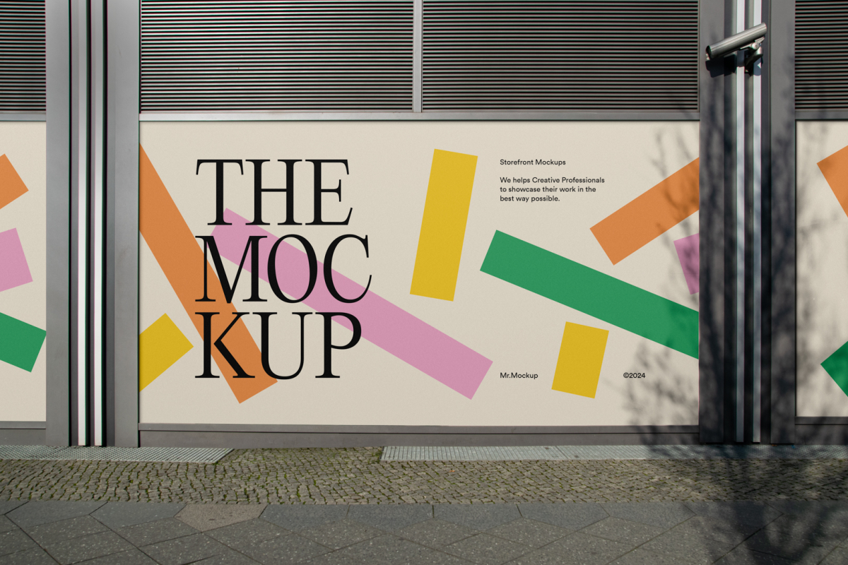 Front view, at an angle of 45 degrees, three colorful rectangle spaces with black strong typography built into a building elevation from storefront mockups product.
