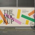 Front view, at an angle of 45 degrees, three colorful rectangle spaces with black strong typography built into a building elevation from storefront mockups product.