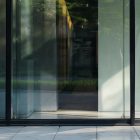 Front view, transparent window with black frames from storefront mockups product.