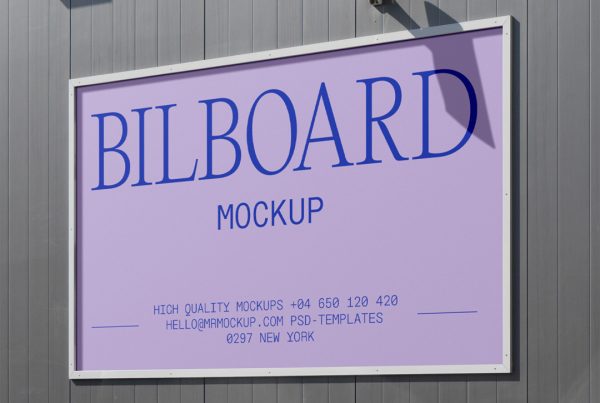 Front view, billboard mockup with a silver frame attached to the gray elevation