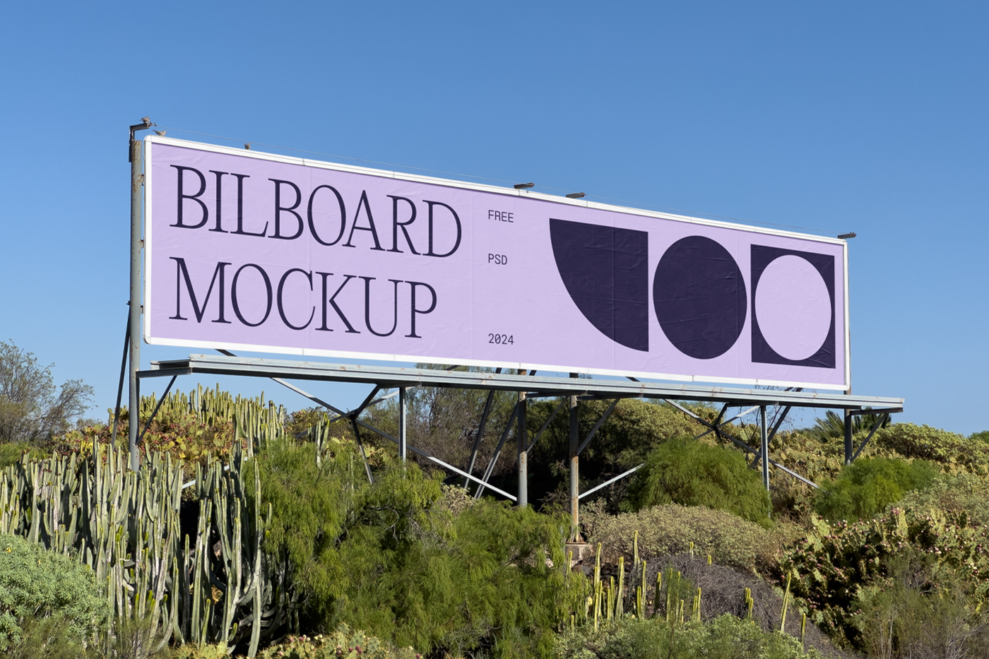 Front view, horizontal billboard mockup with silver frame between trees.