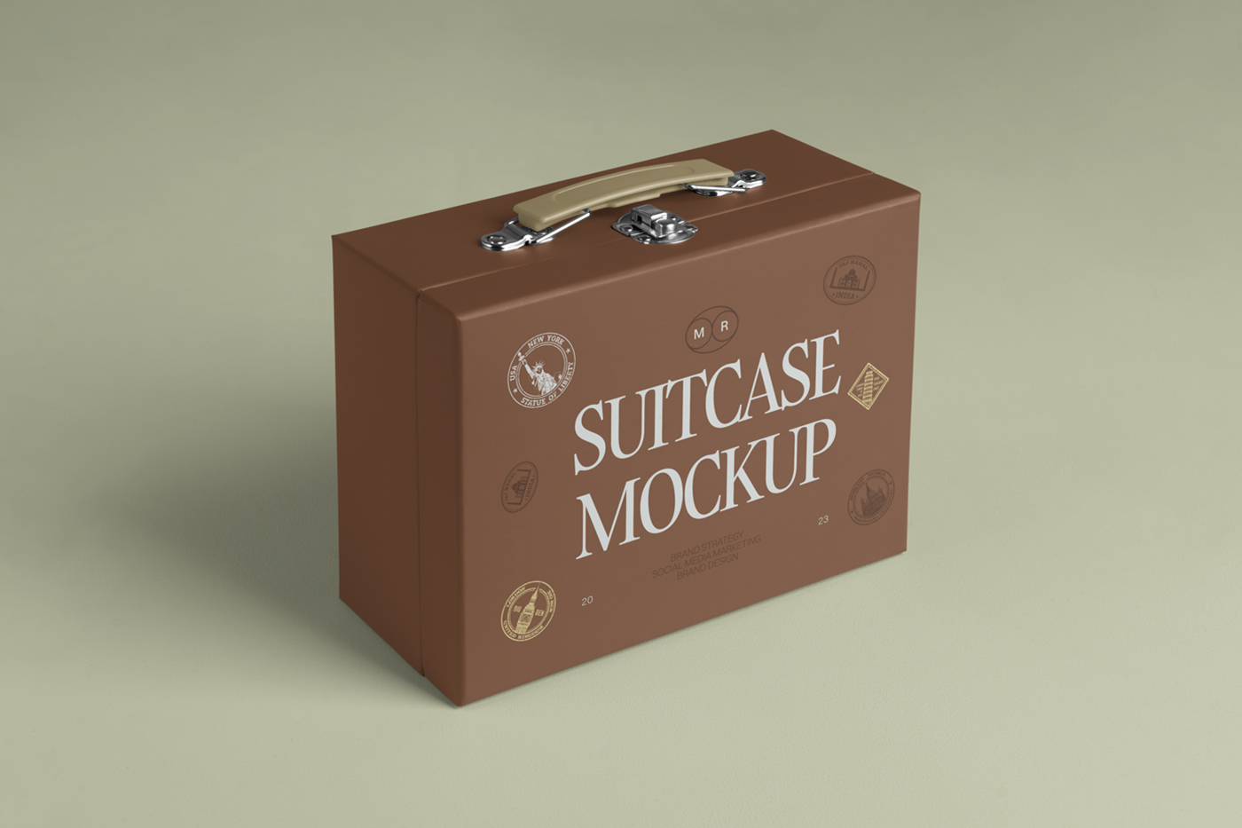 Front view, vintage suitcase box mockup standing on the green floor.