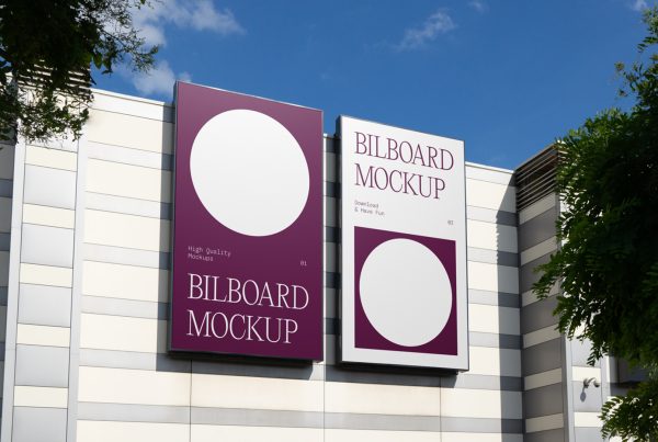 Front view, two big vertical billboard mockup attached to the modern building elevation.