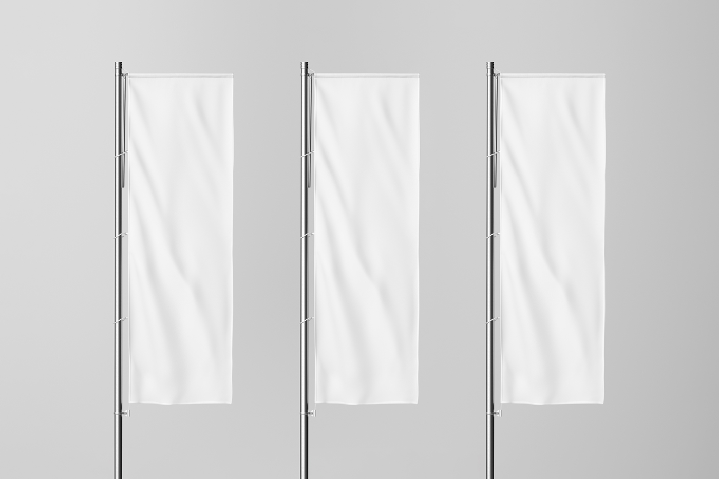 Front view, three white vertical flag mockups standing in front of the gray wall.
