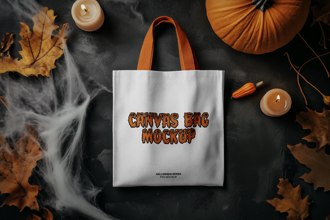 View from above, Halloween canvas bag mockup laying on the black floor.