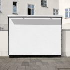 Front view, white city billboard mockup with the building in the background.
