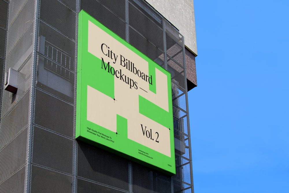 Big square city billboard mockup with bright beige, green design and green coffer attached to the building elevation.