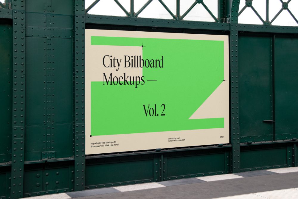 Big horizontal city billboard mockup with a green, beige design attached to the dark green metallic wall elevation.