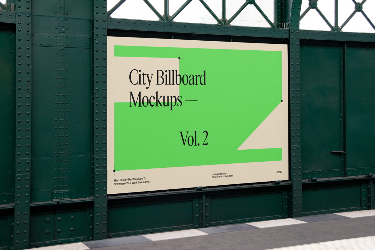 Big horizontal city billboard mockup with a green, beige design attached to the dark green metallic wall elevation.