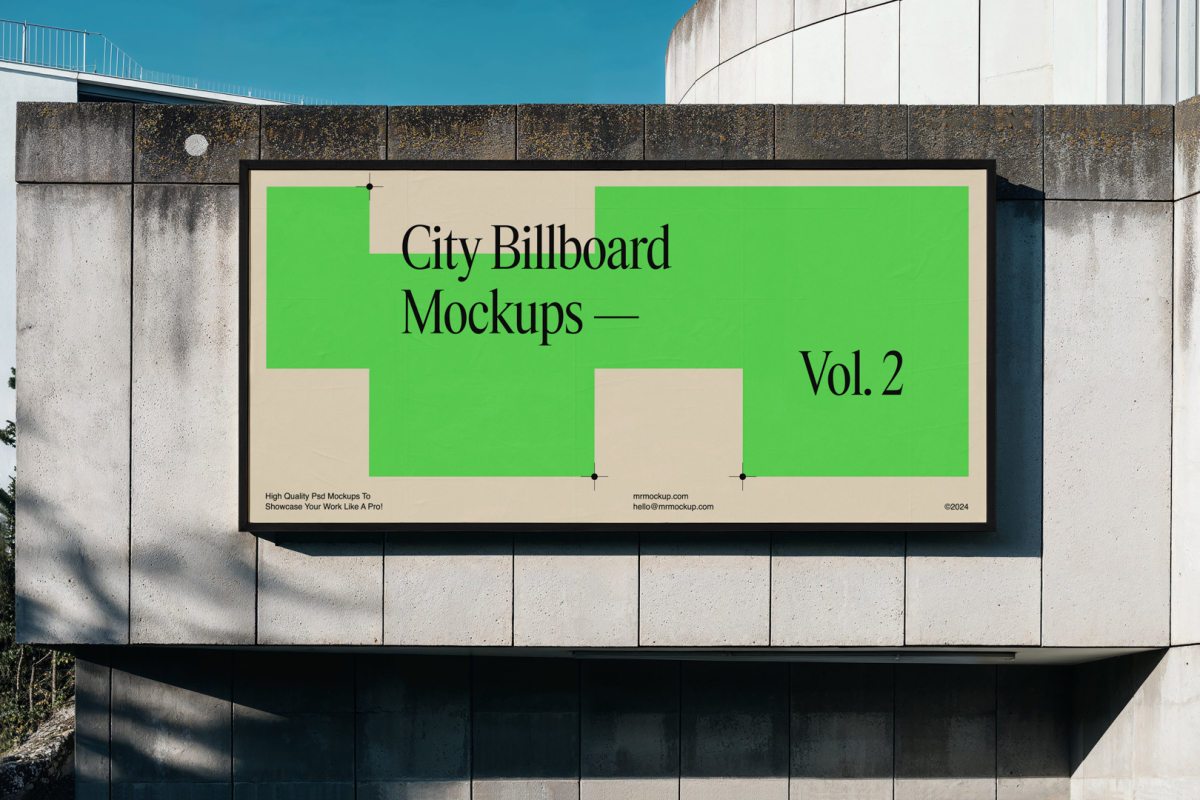 Front view, horizontal city billboard mockup with bright beige, green design and black frames attached to the concrete building facade.