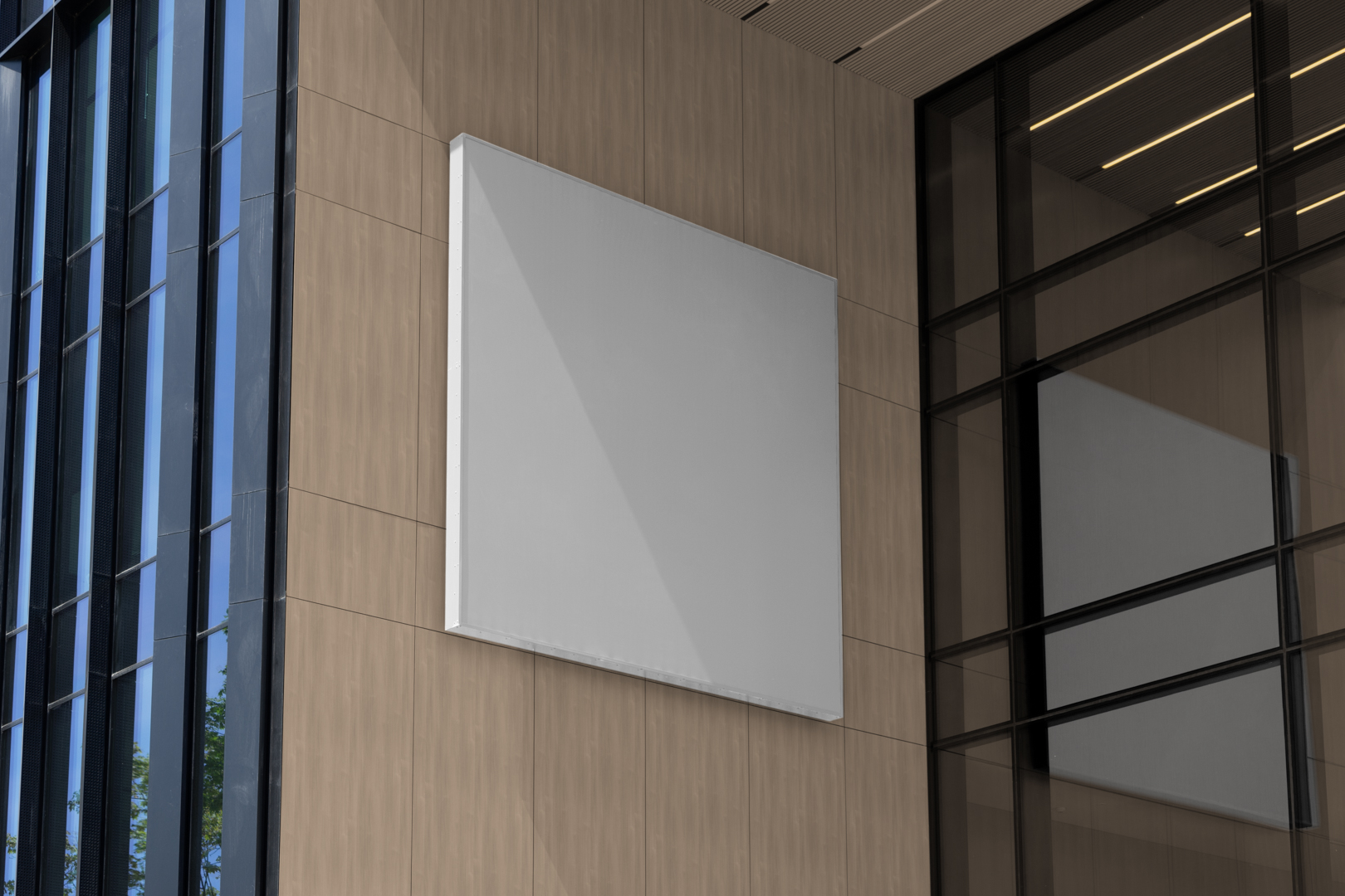 White square city billboard mockup with white frames attached to the beige building facade.