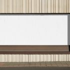 Front view, white horizontal city billboard mockup built into the building elevation.