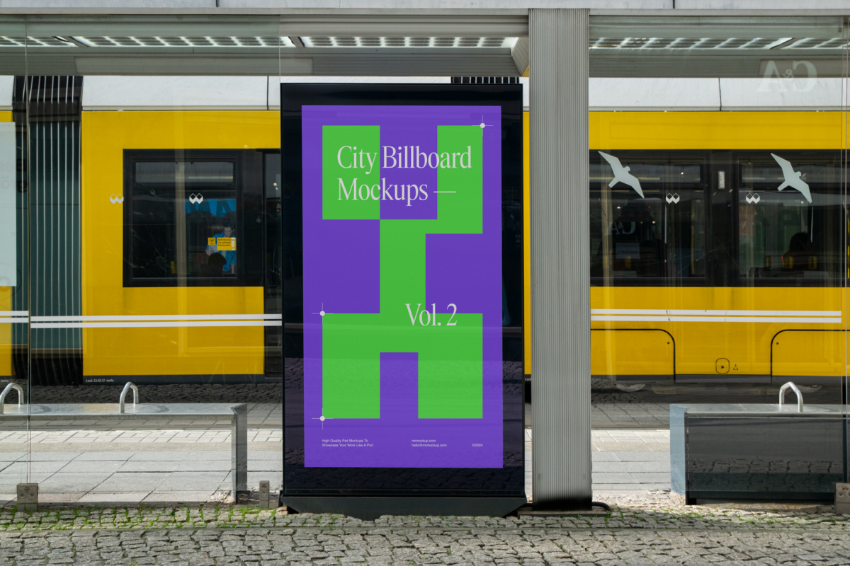 City billboard mockup with a green, purple design attached to the bus stop with a city tram view in the background.