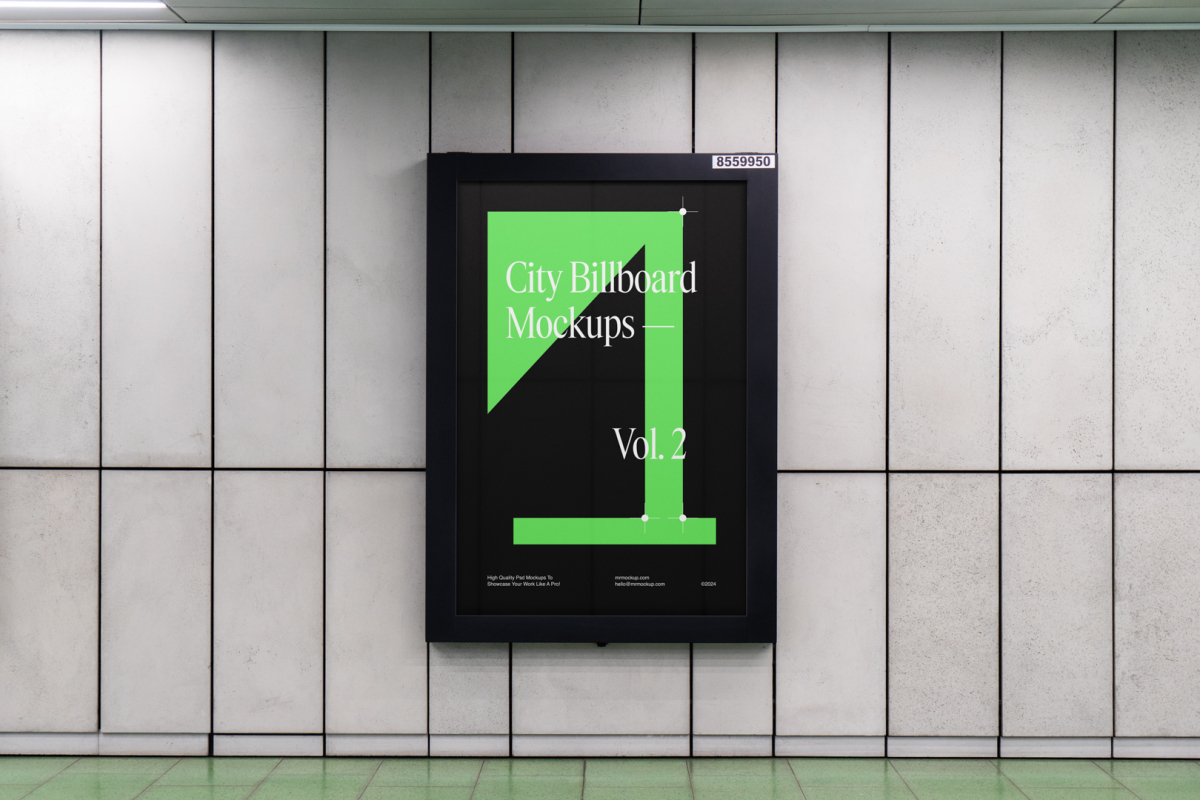 Vertical city billboard mockup with green and black design and black strong frame attached to the gray wall.