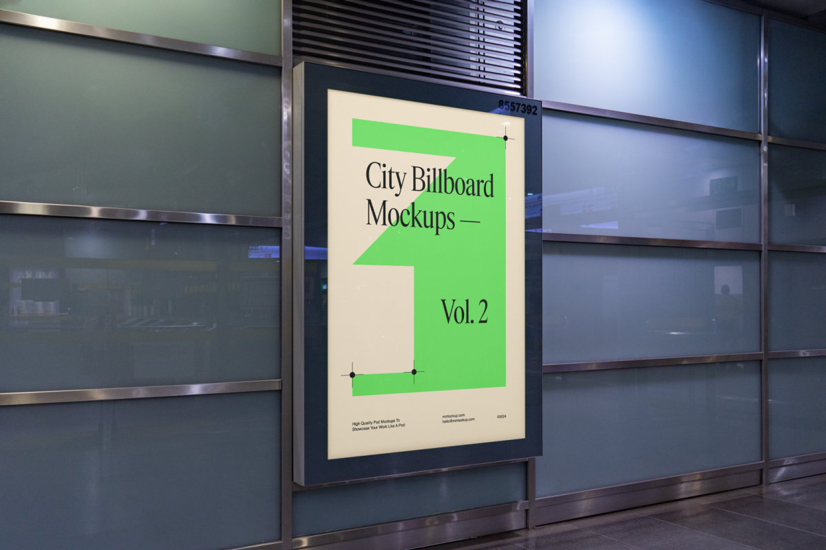 Vertical city billboard mockup with bright beige design attached to the wall.