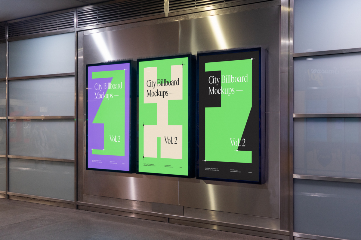 Three vertical city billboard mockups with green, purple, and black design with black frames attached to the silver metallic wall.
