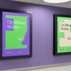 Two vertical city billboard mockups with green and purple design and black strong frames attached to the purple wall.