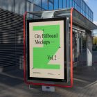 City billboard mockup attached to the bus stop with the city view in the background.