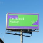 Front view, city billboard mockup with the clean blue sky in the background.
