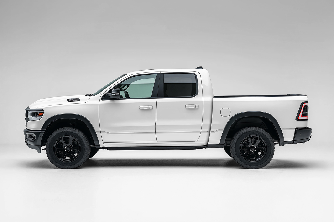 Front view, white pickup truck mockup standing in photography studio in front of the white wall.