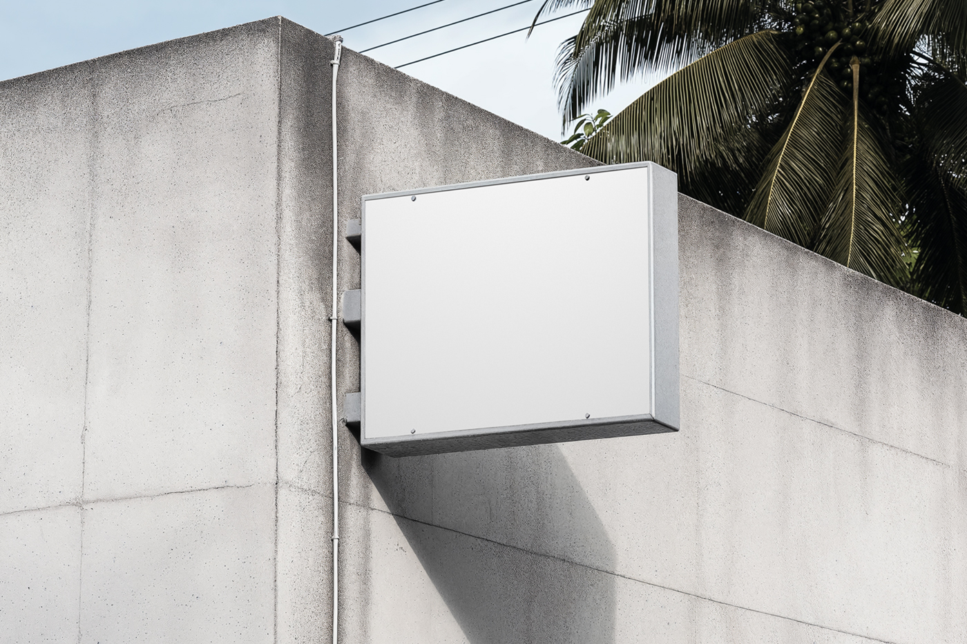 Front view, white rectangle sign mockup with a metal frame attached to the concrete wall.