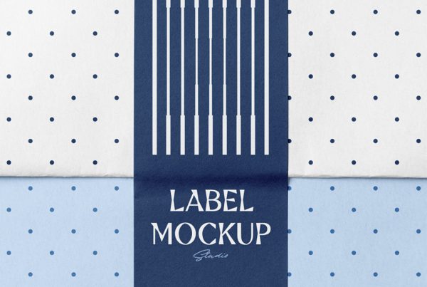 View from above, blue wrapping paper mockup with navy label on it.