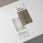 View from above, two laying Trifold Mockups on the white box.