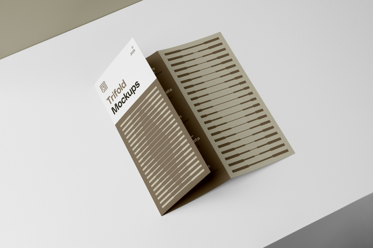 View from above, at a 45-degree angle of Trifold Mockup arranged in the letter z laying on a white box.