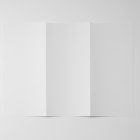 View from above, of a single open white Trifold Mockup laying on the white floor.