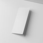 View from above, at a 45-degree angle of a single white Trifold Mockup laying on a white box.